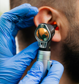 Checking the ear for infection